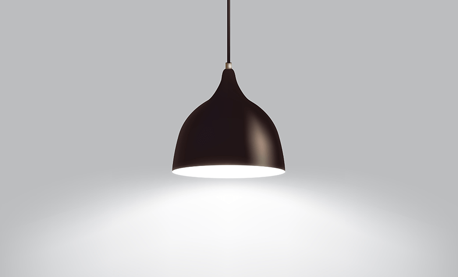 Czarna lampa wisząca rzucająca jasne światło – sztuka reklamy