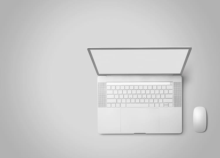 Biały laptop i myszka, czyli nowoczesna sztuka reklamy